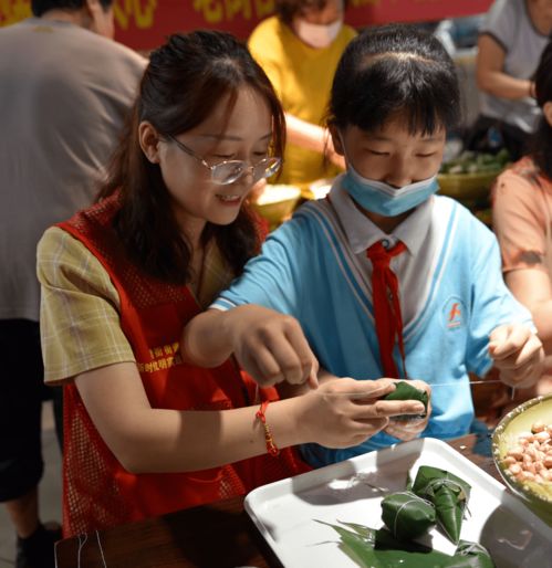 粽情端午 傳承文化——新大新攜手老街社區成功舉辦迎端午包粽子文化藝術交流活動